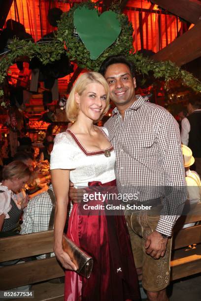 Natascha Gruen and her boyfriend Param Multani during the Oktoberfest at Theresienwiese on September 23, 2017 in Munich, Germany.