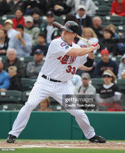 Justin Morneau of the Minnesota Twins waits for a pitch during a Grapefruit League Spring Training Game against the Boston Red Sox at Hammond Stadium...