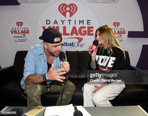 Billy The Kidd and Julia Michaels backstage during the Daytime Village Presented by Capital One at the 2017 HeartRadio Music Festival at the Las...