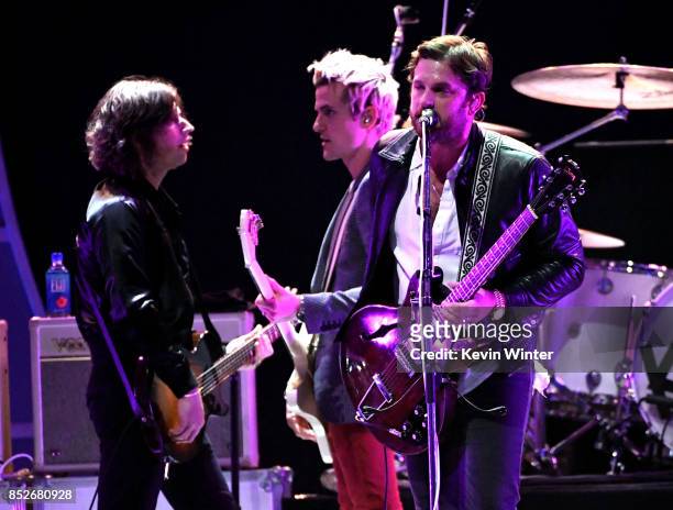 Matthew Followill, Jared Followill and Caleb Followill of Kings of Leon perform onstage during the 2017 iHeartRadio Music Festival at T-Mobile Arena...