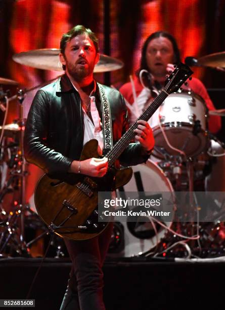 Caleb Followill and Nathan Followill of music group Kings Of Leon perform onstage during the 2017 iHeartRadio Music Festival at T-Mobile Arena on...