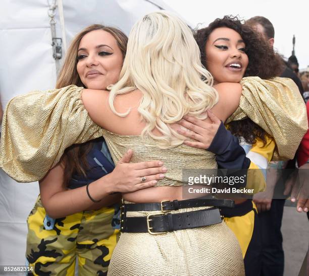 Bebe Rexha with Jade Thirlwall and Leigh-Anne Pinnock of Little Mix backstage during the Daytime Village Presented by Capital One at the 2017...