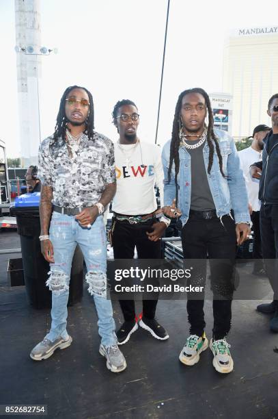 Quavo, Offset and Takeoff of Migos pose backstage during the Daytime Village Presented by Capital One at the 2017 HeartRadio Music Festival at the...