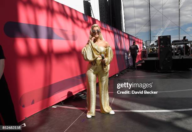 Bebe Rexha poses backstage during the Daytime Village Presented by Capital One at the 2017 HeartRadio Music Festival at the Las Vegas Village on...