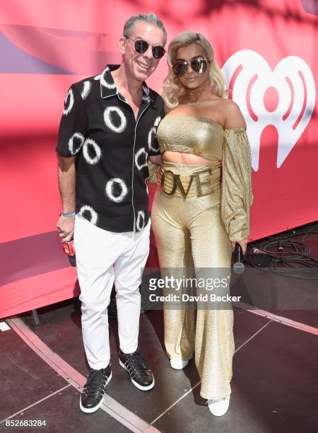 Elvis Duran and Bebe Rexha pose backstage during the Daytime Village Presented by Capital One at the 2017 HeartRadio Music Festival at the Las Vegas...