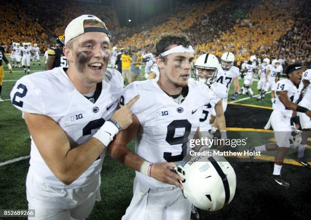 Quarterbacks Tommy Stevens and Trace McSorley of the Penn State Nittany Lions celebrate after defeating the Iowa Hawkeyes on September 23, 2017 at...