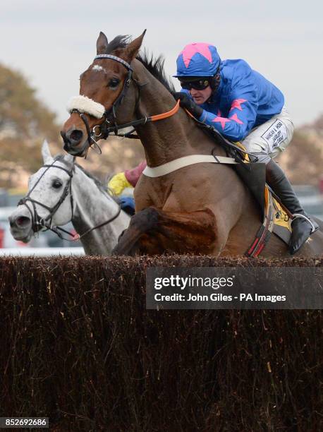 Cue Card and Joe Tizzard on their way to victory in the Betfair Chase during the Betfair Chase Festival at Haydock Park Racecourse, Newton-le-Willows.