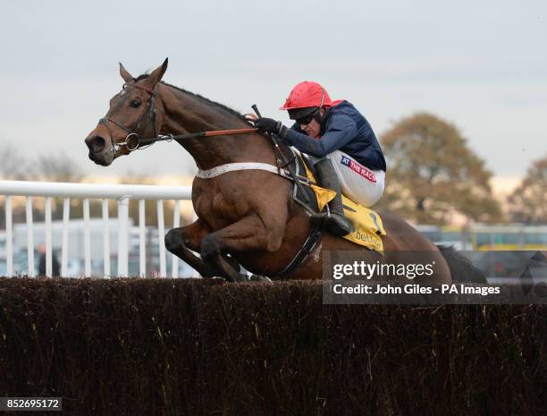 Bobs Worth and Barry Geraghty, the Cheltenham Gold Cup Winner, struggle to get over the final fence in the Betfair Chase during the Betfair Chase...