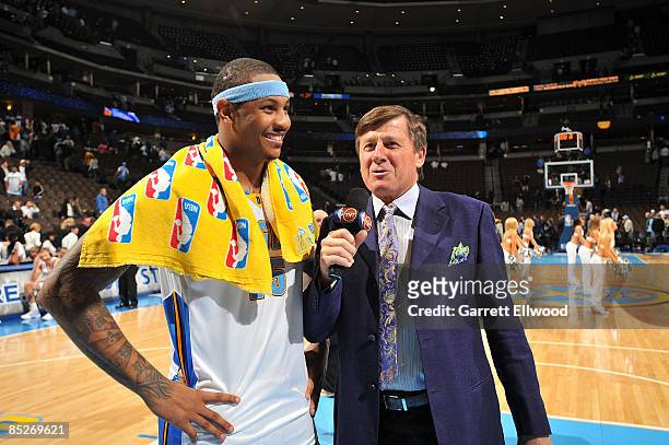 Carmelo Anthony of the Denver Nuggets talks with Craig Sager of TNT after the game against the Portland Trail Blazers on March 5, 2009 at the Pepsi...