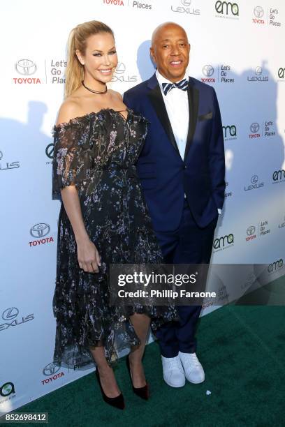 Kennedy Summers and Russell Simmons at the Environmental Media Association's 27th Annual EMA Awards at Barkar Hangar on September 23, 2017 in Santa...