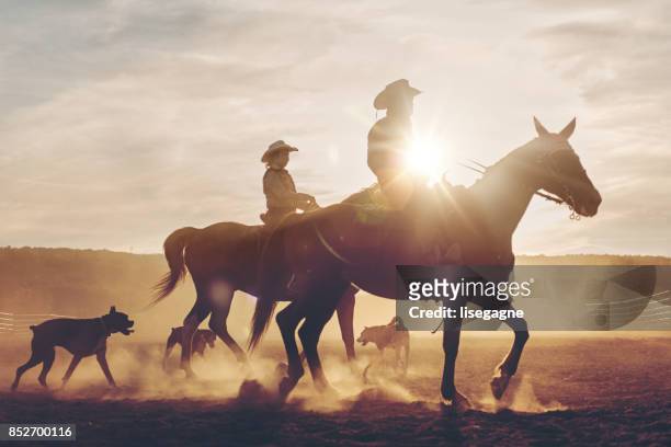 multi-generation family riders - ranch stock pictures, royalty-free photos & images