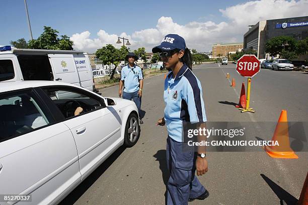 South African police search cars on March 6, 2009 in Durban ahead of the first day of the second test match bewteen South Africa and Australia at...