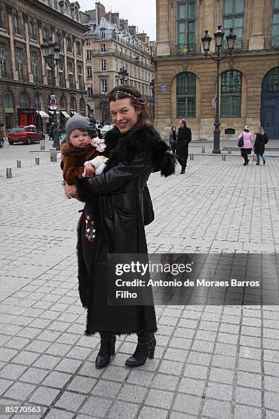 Milla Jovovich and her son go sightseeing on March 5, 2009 in Paris, France.