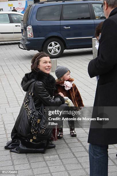 Milla Jovovich and her son go sightseeing on March 5, 2009 in Paris, France.
