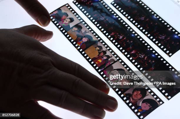 Omega Auctions salesroom manager Karen Fairweather lays out some of the unseen and unpublished images of The Beatles from late 1967/early 1968,...