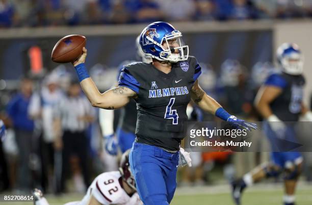 Riley Ferguson of the Memphis Tigers looks to pass against the Southern Illinois Salukis on September 23, 2017 at Liberty Bowl Memorial Stadium in...