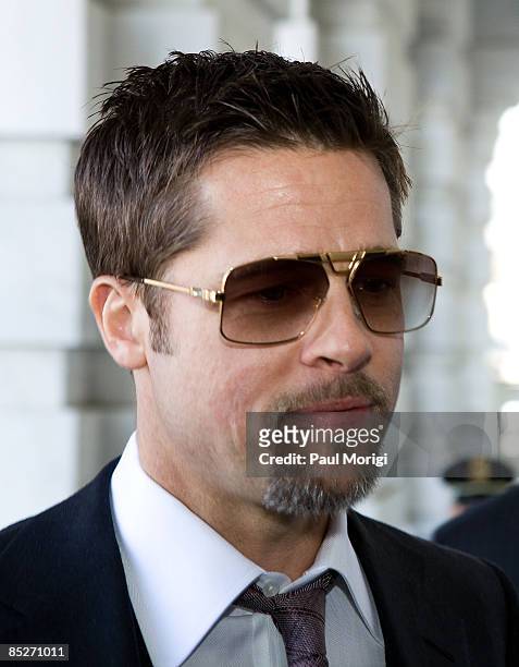 Actor Brad Pitt arrives at The U.S. Capitol Building on his way to a "Make it Right" project press conference in the Speaker's Balcony Hallway in The...