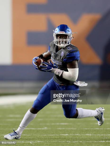 Patrick Taylor of the Memphis Tigers runs with the ball against the Southern Illinois Salukis on September 23, 2017 at Liberty Bowl Memorial Stadium...