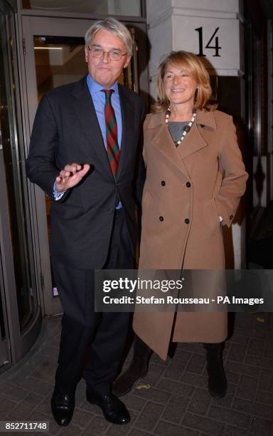 Andrew Mitchell and his wife Dr Sharon Bennett leave a press conference in London, where he gave his reaction to the Crown Prosecution Service...