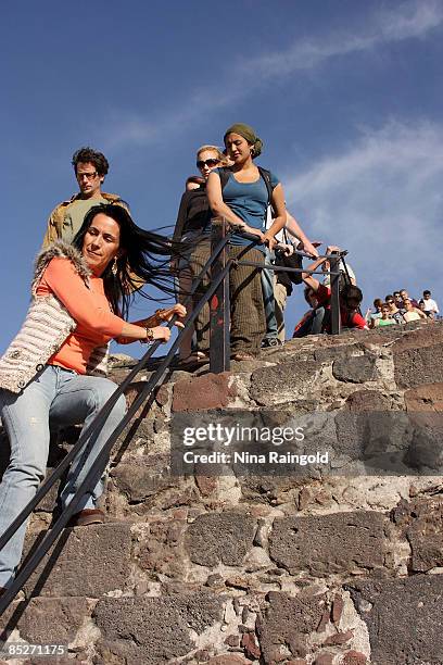 Tourists climb down the steep steps of the Pyramid of the Sun on February 07, 2009 in Teotihuacan, Mexico. The ancient pre-hispanic site of...