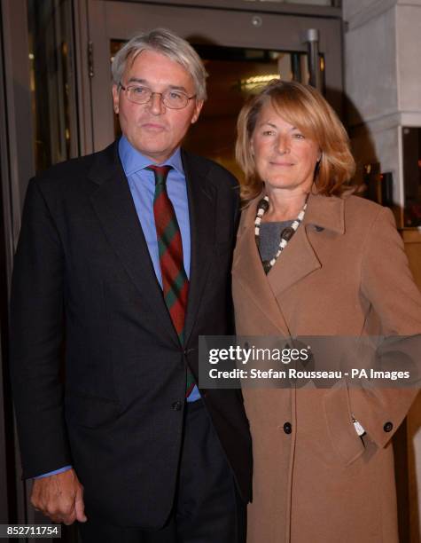 Andrew Mitchell and his wife Dr Sharon Bennett leave a press conference in London, where he gave his reaction to the Crown Prosecution Service...