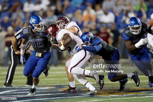 Jonathan Mixon of the Southern Illinois Salukis runs with the ball against Austin Hall of the Memphis Tigers on September 23, 2017 at Liberty Bowl...
