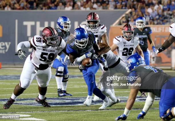 Anthony Miller of the Memphis Tigers runs after the catch against ZeVeyon Furcron of the Southern Illinois Salukis on September 23, 2017 at Liberty...