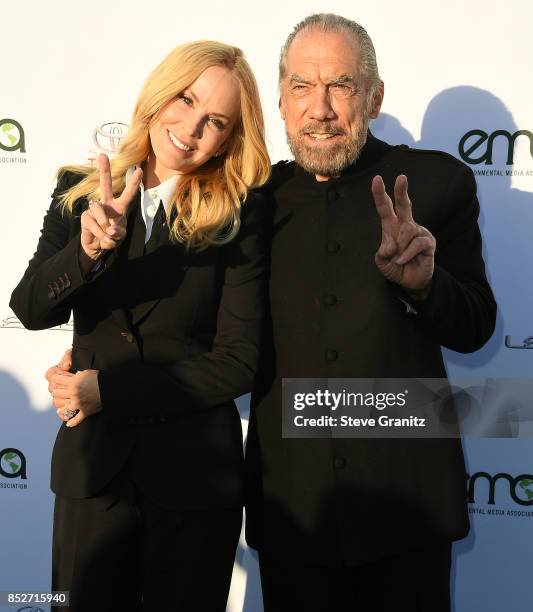 Eloise Broady, John Paul DeJoria arrives at the 27th Annual EMA Awards at Barker Hangar on September 23, 2017 in Santa Monica, California.