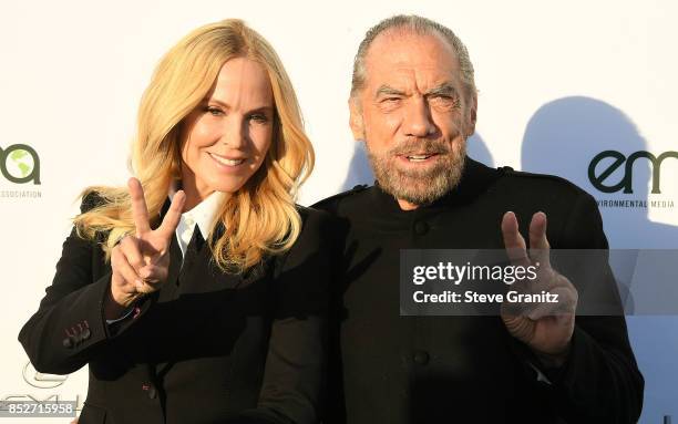 Eloise Broady, John Paul DeJoria arrives at the 27th Annual EMA Awards at Barker Hangar on September 23, 2017 in Santa Monica, California.