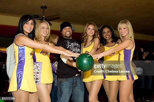 Recording artist Frankie Needles and the Laker Girls attend the 3rd Annual Stars & Strikes Celebrity Bowling and Poker Tournament at PINZ on March 5,...