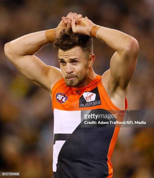 Brett Deledio of the Giants looks dejected after a loss in his 250th game against his former side to go through to the grand final during the 2017...