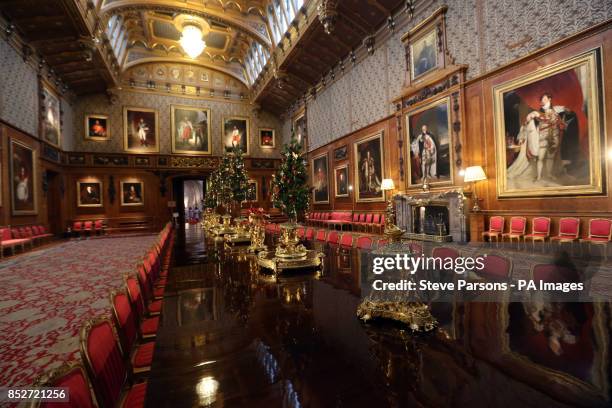 The table is laid with silver-gilt from the magnificent Grand Service in the Waterloo Chamber, which is part of the Christmas display at Windsor...