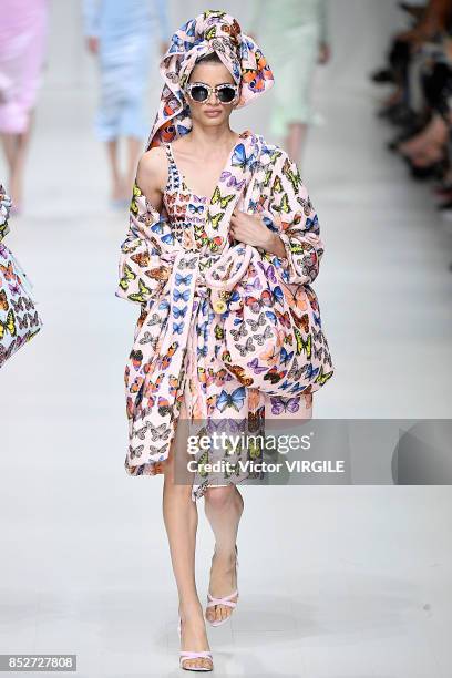 Model walks the runway at the Versace Ready to Wear Spring/Summer 2018 fashion show during Milan Fashion Week Spring/Summer 2018 on September 22,...