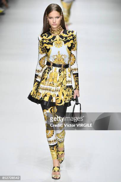 Model walks the runway at the Versace Ready to Wear Spring/Summer 2018 fashion show during Milan Fashion Week Spring/Summer 2018 on September 22,...