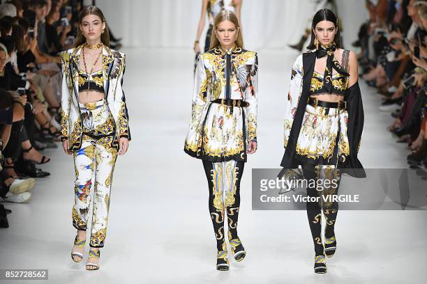 Kendall Jenner and models walk the runway at the Versace Ready to Wear Spring/Summer 2018 fashion show during Milan Fashion Week Spring/Summer 2018...