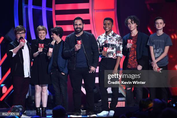 Enrique Santos with Jeremy Ray Taylor, Sophia Lillis, Jack Dylan Grazer, Chosen Jacobs, Wyatt Oleff, and Jaeden Lieberher speak onstage at the 2017...