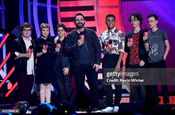 Enrique Santos with Jeremy Ray Taylor, Sophia Lillis, Jack Dylan Grazer, Chosen Jacobs, Wyatt Oleff, and Jaeden Lieberher speak onstage at the 2017...