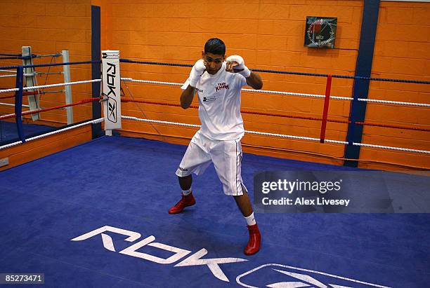 Amir Khan is seen shadow boxing during a media workout at the Gloves Community Centre on March 6, 2009 in Bolton, England. Amir Khan is due to fight...