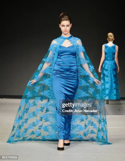 Model walks the runway wearing Katherine Tessier at 2017 Vancouver Fashion Week - Day 6 on September 23, 2017 in Vancouver, Canada.