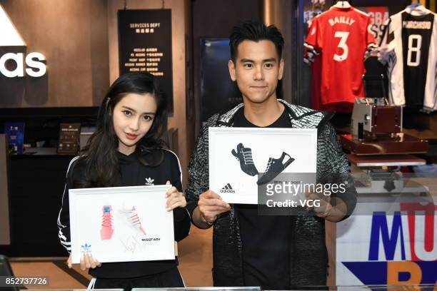 Actor Eddie Peng and actress Angelababy attend Adidas activity on September 23, 2017 in Shanghai, China.