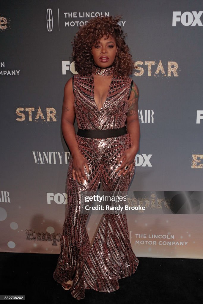 Actress Ta'Rhonda Jones poses on the red carpet during the "Empire