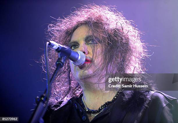 Robert Smith of The Cure performs at the 02 Arena as part of NME's Big Gig on February 26, 2009 in London, England.