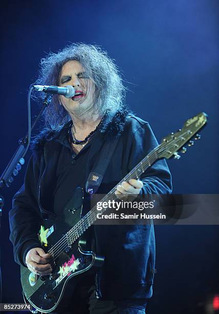 Robert Smith of The Cure performs at the 02 Arena as part of NME's Big Gig on February 26, 2009 in London, England.