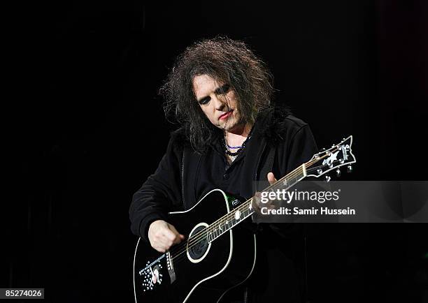 Robert Smith of The Cure performs at the 02 Arena as part of NME's Big Gig on February 26, 2009 in London, England.