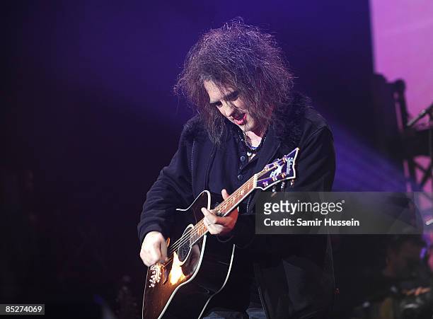 Robert Smith of The Cure performs at the 02 Arena as part of NME's Big Gig on February 26, 2009 in London, England.