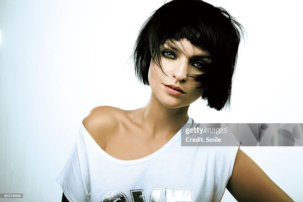 Young woman with short black hair