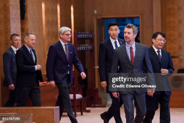 Crown Prince Frederik of Denmark followed by Danish Minister of Higher Education, Soren Pind and The Ambassador of Danmark, A. Carsten Damsgaard...