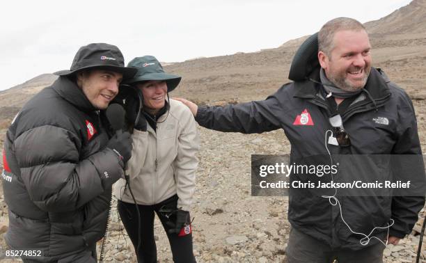 Gary Barlow, Denise Van Outen and Chris Moyles record a live phone in for radio one on day six day of The BT Red Nose Climb of Kilimanjaro on March...
