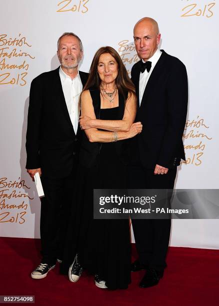 Terry Jones and Tricia Jones with the award for Outstanding Achievement in Fashion and Dylan Jones OBE, during the 2013 British Fashion Awards, at...