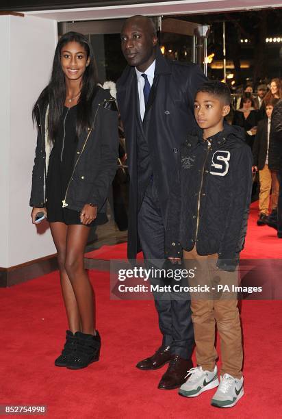 Ozwald Boateng and his children Emilia and Oscar arriving for the World Premiere of The Hunger Games : Catching Fire, at the Odeon Leicester Square,...